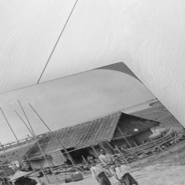 House built of bamboo on rafts, Bhamo, Burma by Stereo Travel Co