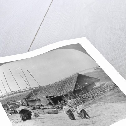 House built of bamboo on rafts, Bhamo, Burma by Stereo Travel Co