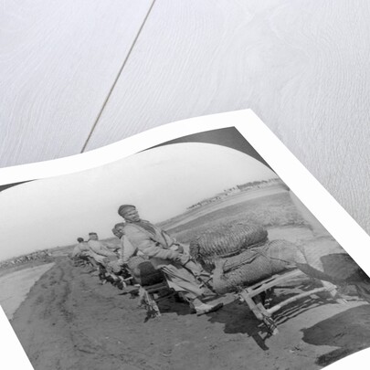 Conveying salt to the interior by wheelbarrow train by Keystone View Company