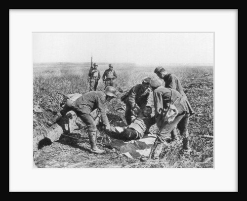 Wounded German soldier being moved by prisoners, Aisne, France by Anonymous