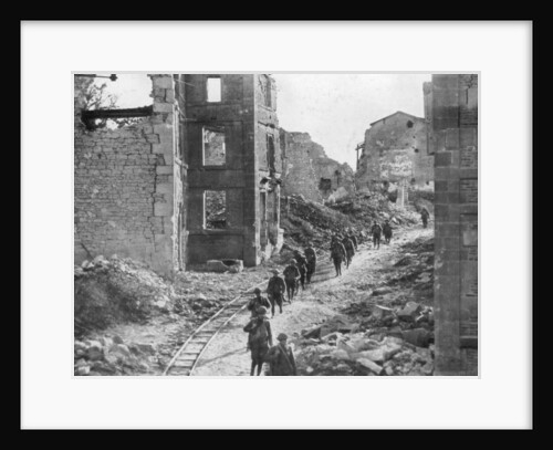 American soldiers passing through the ruins of Varennes, Meuse-Argonne Offensive, France by Anonymous