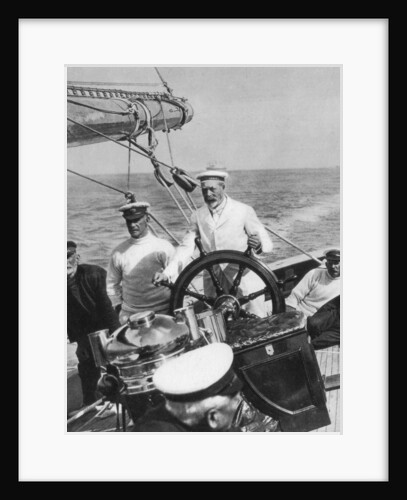 King George V at the helm of his yacht Britannia by Anonymous