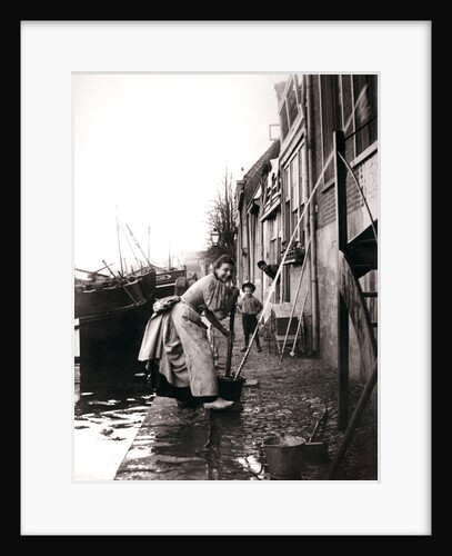 Woman mopping the street, Dordrecht, Netherlands by James Batkin