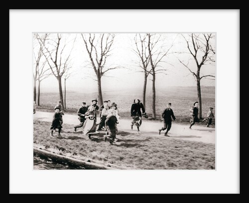 Children running alongside a canal, Monnickendam, Netherlands by James Batkin