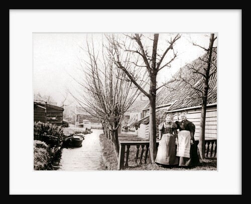 Two women on a canal bank, Broek, Netherlands by James Batkin