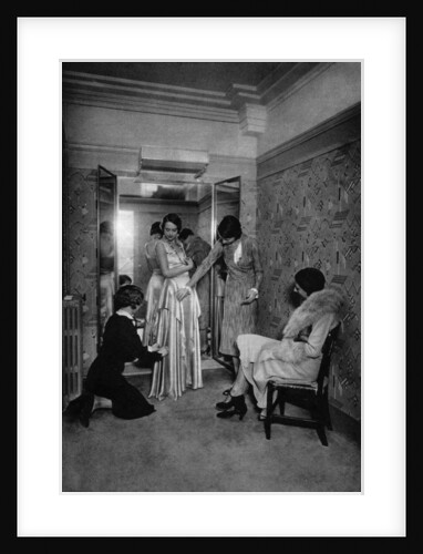 Trying on a dress at a great dressmakers, Paris by Ernest Flammarion