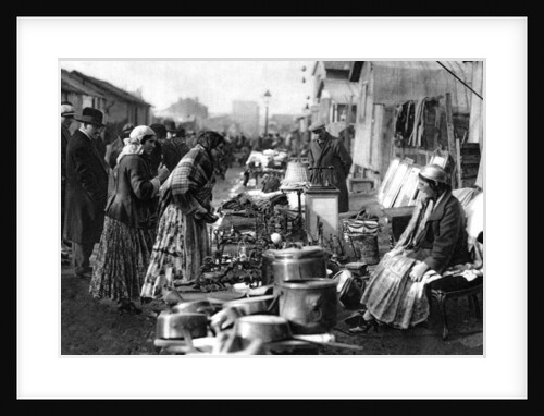 A view of the flea market at the entrance of St Ouen by Ernest Flammarion