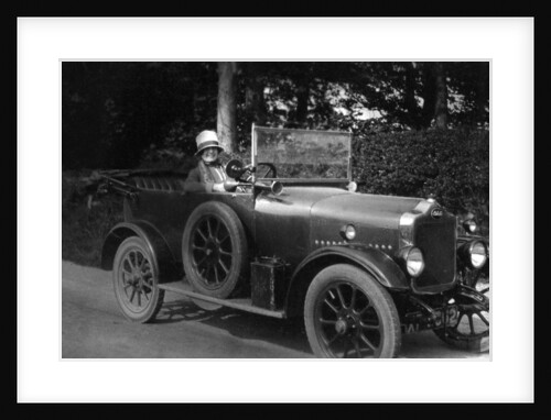 Woman driving a car by Anonymous