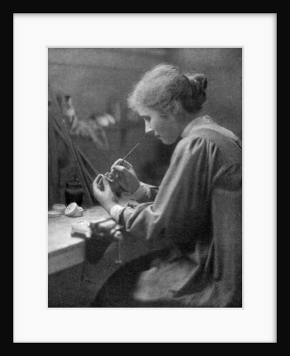 A craftswoman at work by ET Holding