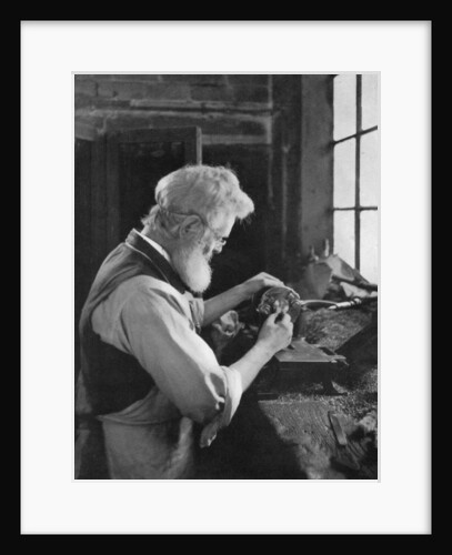 A watch cap maker at work by AL Hitchin