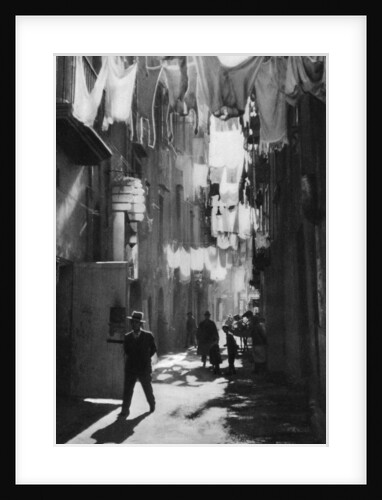 Narrow street in Naples, Italy by Martin Hurlimann