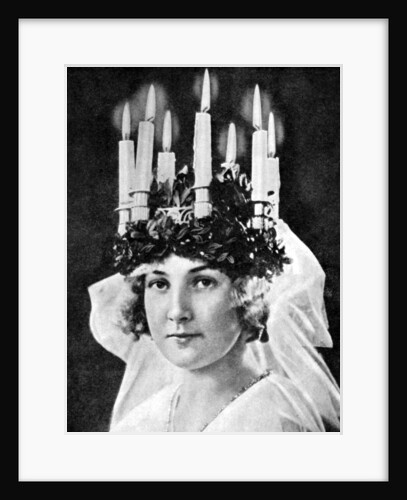 Scandinavian girl wearing candle headdress on St Lucy's Day by Fox