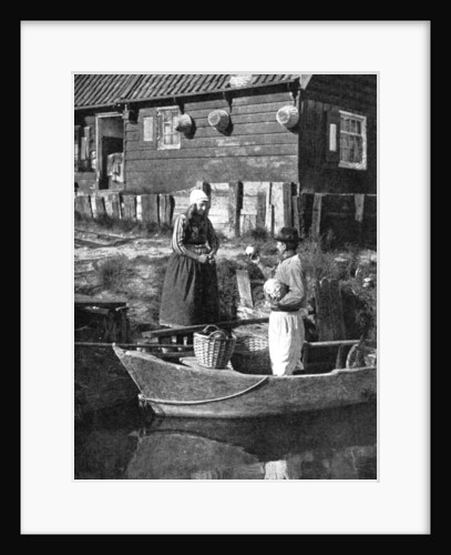 Greengrocer bringing goods by boat, Marken, Holland by Donald McLeish