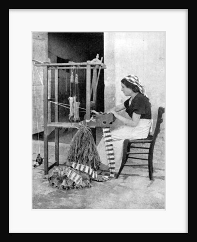 Woman weaving with straw on a hand loom, Fiesole, near Florence, Italy by Donald McLeish
