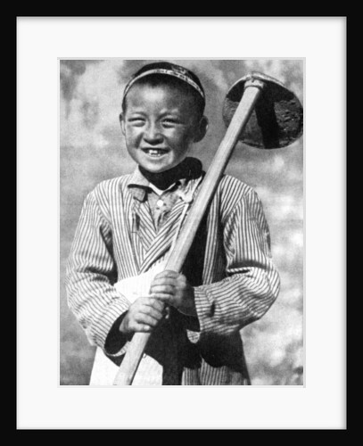 Uzbek schoolboy working on a farm by Anonymous