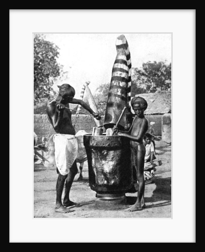 Sesame mill painted in honour of a Hindu goddess, India by Ewing Galloway