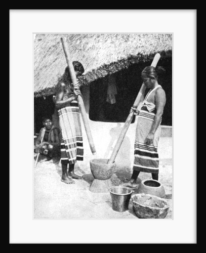 Newar women pounding grain, Nepal by Ewing Galloway
