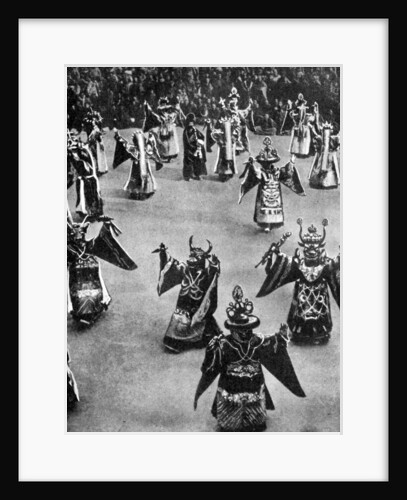 Masked dancers, Tibet by Ewing Galloway