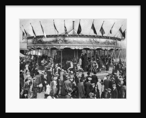 A merry-go-round, part of a bank holiday carnival on Hamstead Heath, London by Anonymous