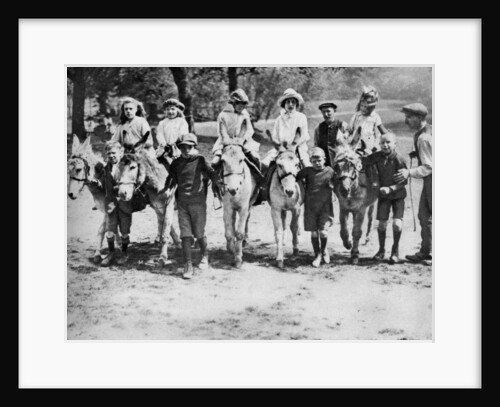 A donkey ride on a bank holiday on Hamstead Heath, London by Anonymous