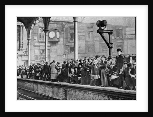 A bank holiday crowd waiting for a train to Margate, London by Anonymous