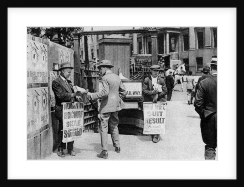 The lunchtime newspaper paper headlines, Trafalgar Square, London by Anonymous