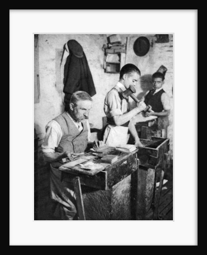 Gold-beating in a London workshop by Anonymous