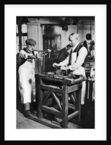 Cutting a key barrel, London by Anonymous