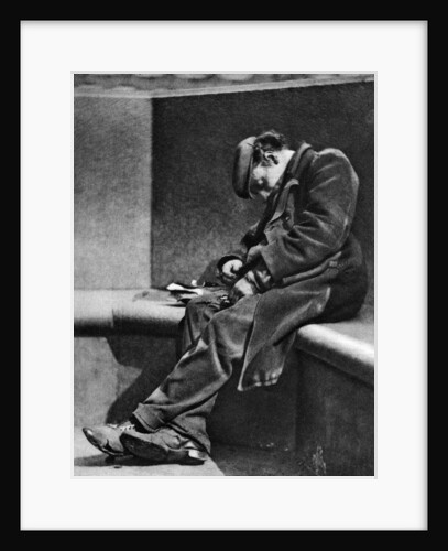 A man sleeping on Blackfriars Bridge, London by Walter Benington