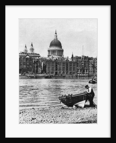 Thames waterman and his boat on the 'beach' at Bankside, London by McLeish
