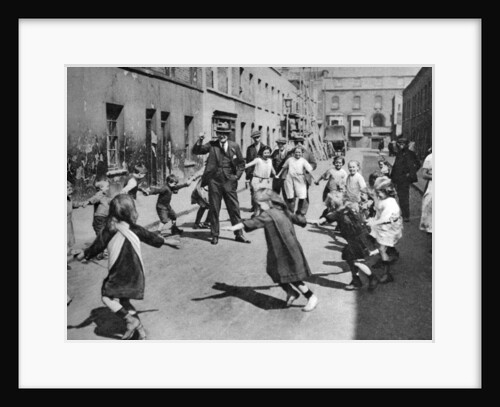 Children dancing in the street, London by Anonymous
