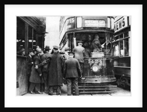 Getting on to a tram at Blackfriars, London by Anonymous