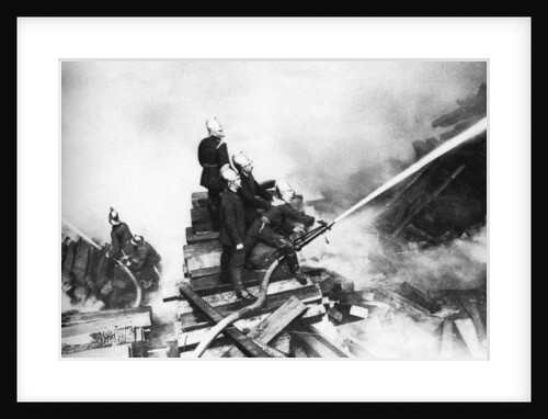 Firemen fighting a fire at a timber yard, London by Anonymous