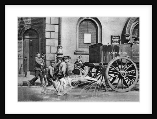 Boys following the Poplar Borough Council water cart, London by Anonymous