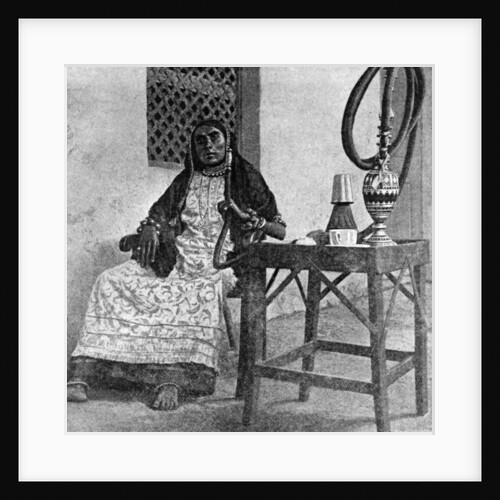 Somali woman smoking a hookah, Aden by Anonymous