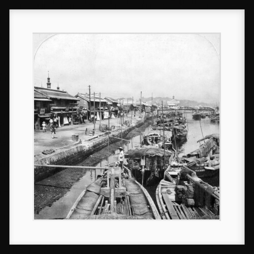 Native boats on a waterway in Yokohama, Japan by Clarence H White