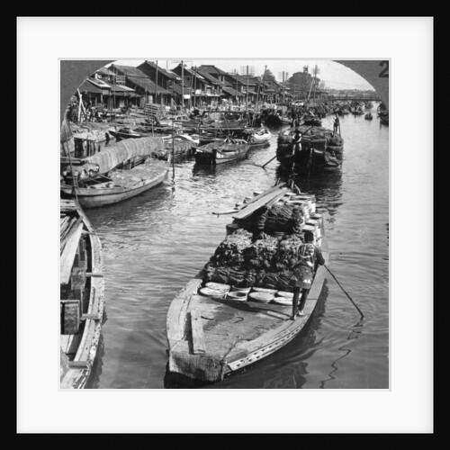 A busy freight canal in Tokyo, Japan by Underwood & Underwood