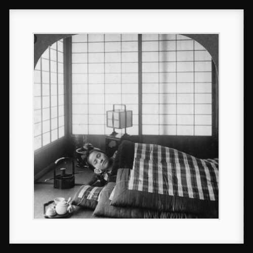 A geisha sleeping in a tea house, Hikone, Japan by Underwood & Underwood