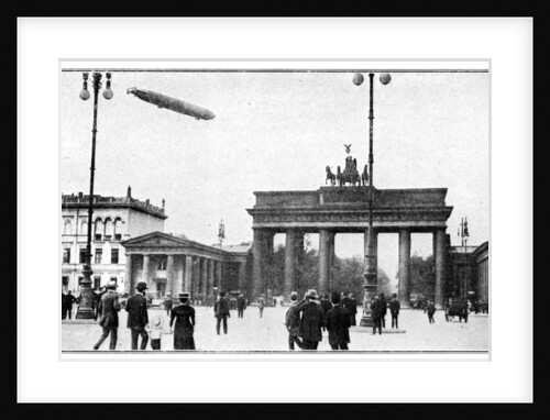 Zeppelin airship passing over Brandenburg Gate, Berlin, First World War by Anonymous