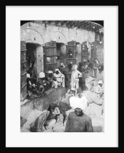 Indian women grinding corn between two round stones, Delhi, India by Rose Rose Stereographs