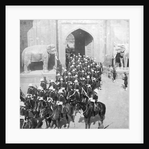 A procession passing through the Delhi Gate, Lahore, Pakistan by HD Girdwood