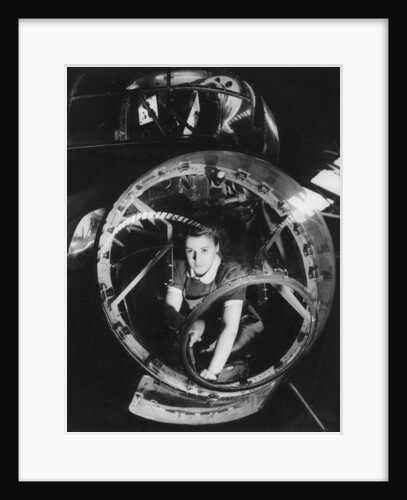 A woman working on a Lancaster bomber, Second World War by Anonymous