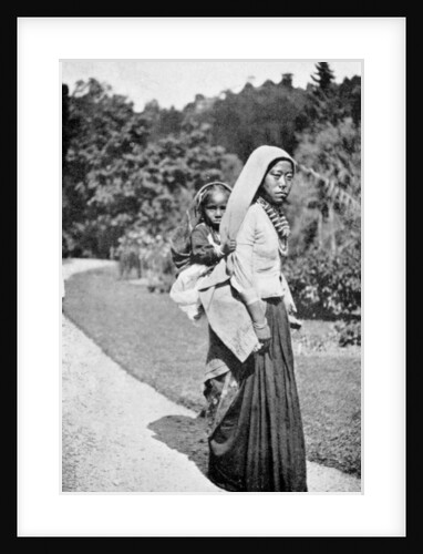 A Nepalese woman with her child by Anonymous