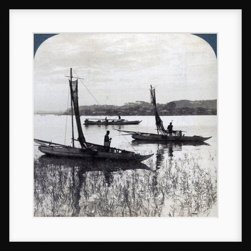 Fishing boats coming home at sunset, near Yokohama, Japan by Underwood & Underwood