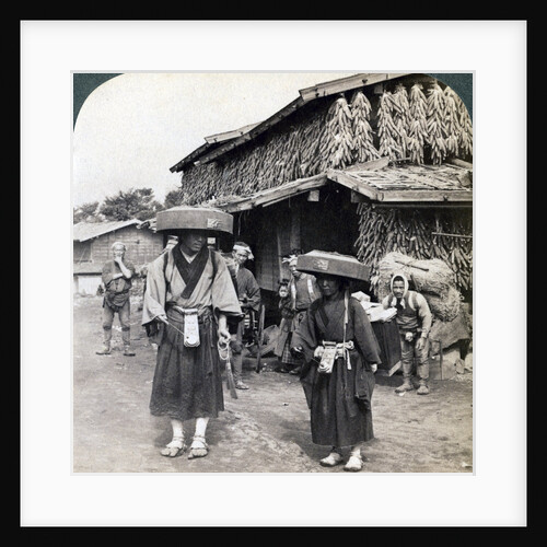 Pilgrim beggars beating little gongs, near Lake Kawaguchi, Japan by Underwood & Underwood