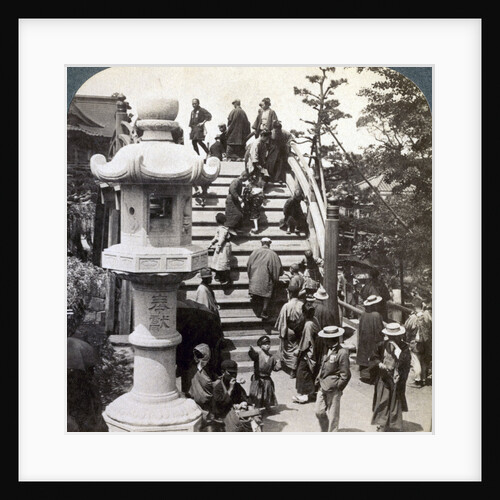 Worshippers crossing the semi-circular bridge to Kameido Temple beyond, looking north, Tokyo, Japan by Underwood & Underwood