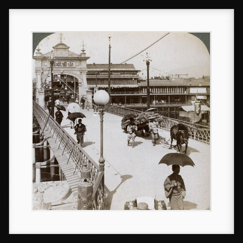 Looking west over the Kamo River (Kamogawa) at Shijo bridge, Kyoto, Japan by Underwood & Underwood