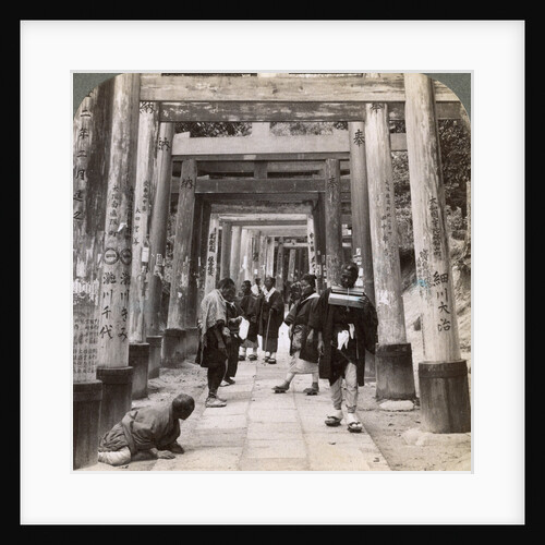 Coming and going under long rows of sacred torii, Shinto temple of Inari, Kyoto, Japan by Underwood & Underwood