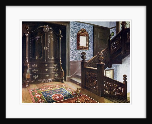 Carved walnut bombe armoire with chased mounts by Edwin Foley