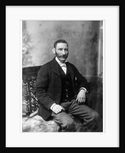 Man sitting in a chair by Theodore Waltenberg